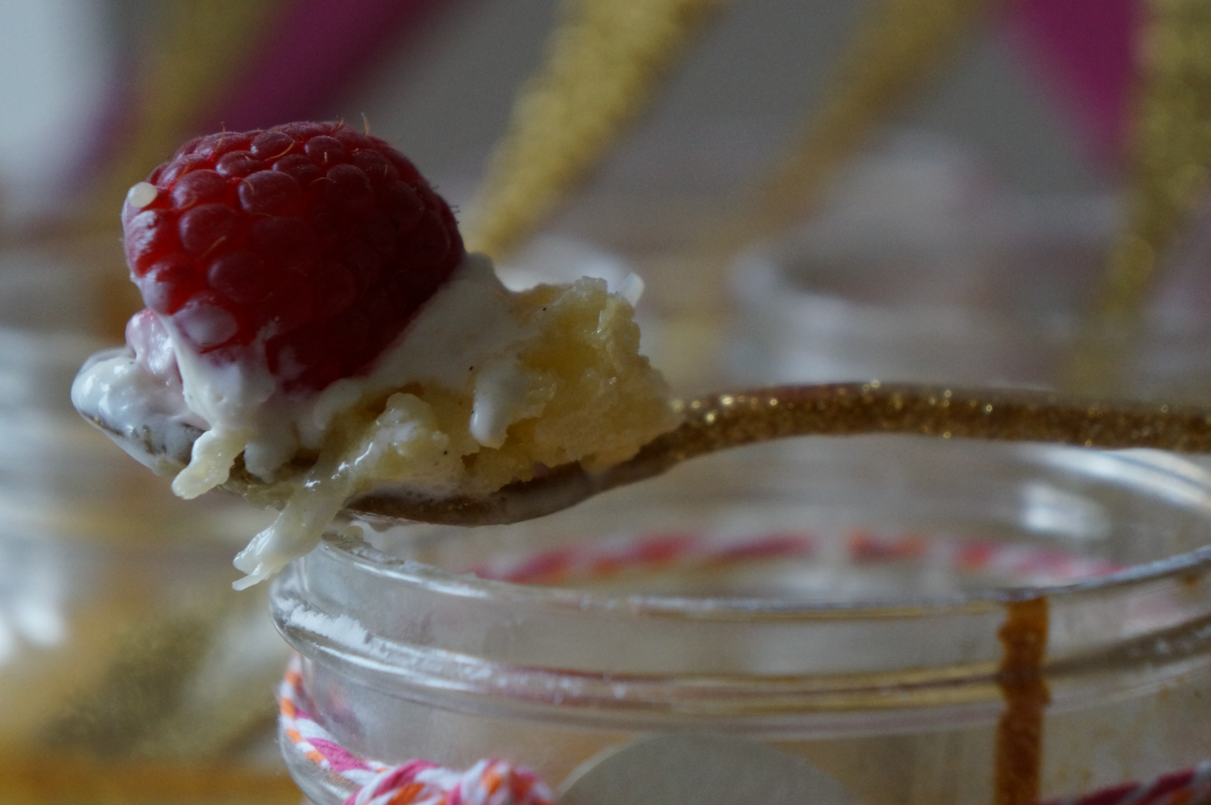 lemon bars with vanilla ice cream and raspberries